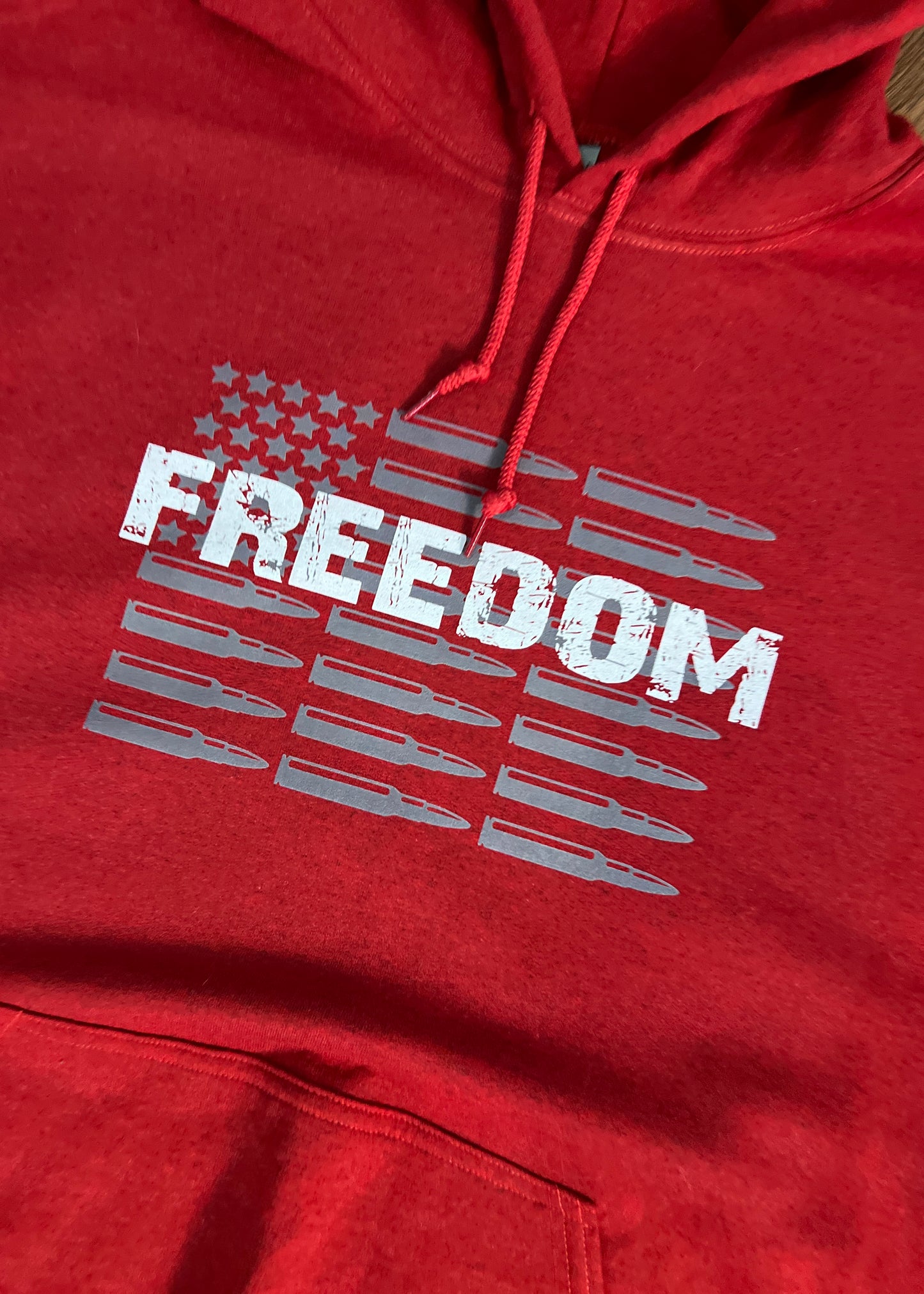 Freedom T-Shirt & Hoodie – Patriotic Apparel with Bold Bullet Flag Design